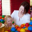 Heidi and Chloe in the ball pit