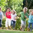 Children running in the garden